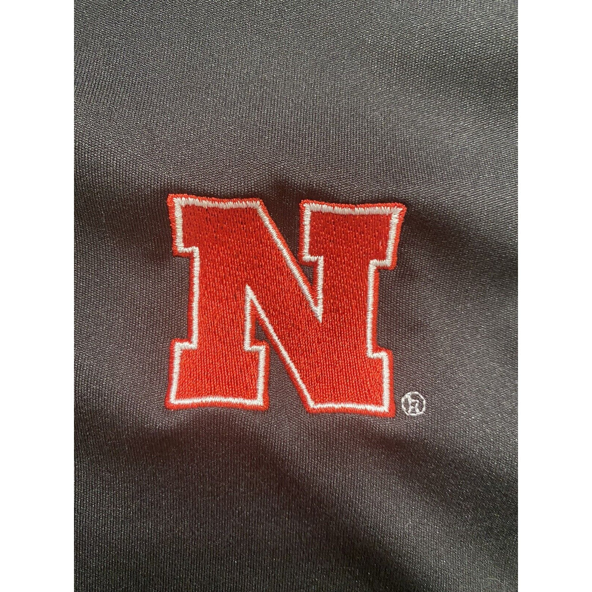 Nebraska Huskers Black Microfiber Cutter & Buck Athletic Polo Shirt