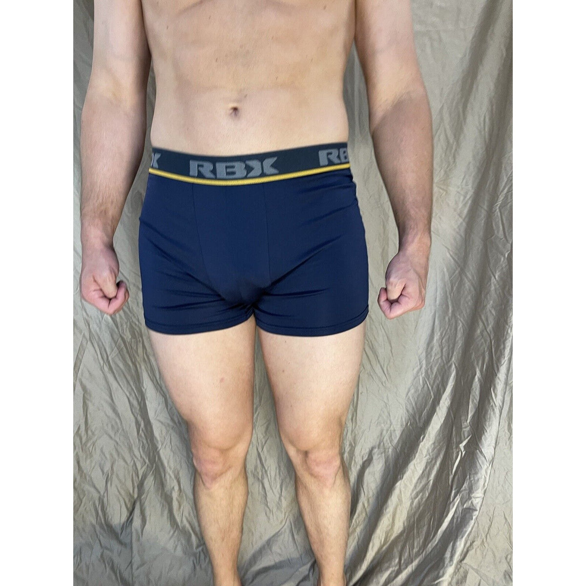 men's blue rbx compression boxer briefs yellow line on band Medium