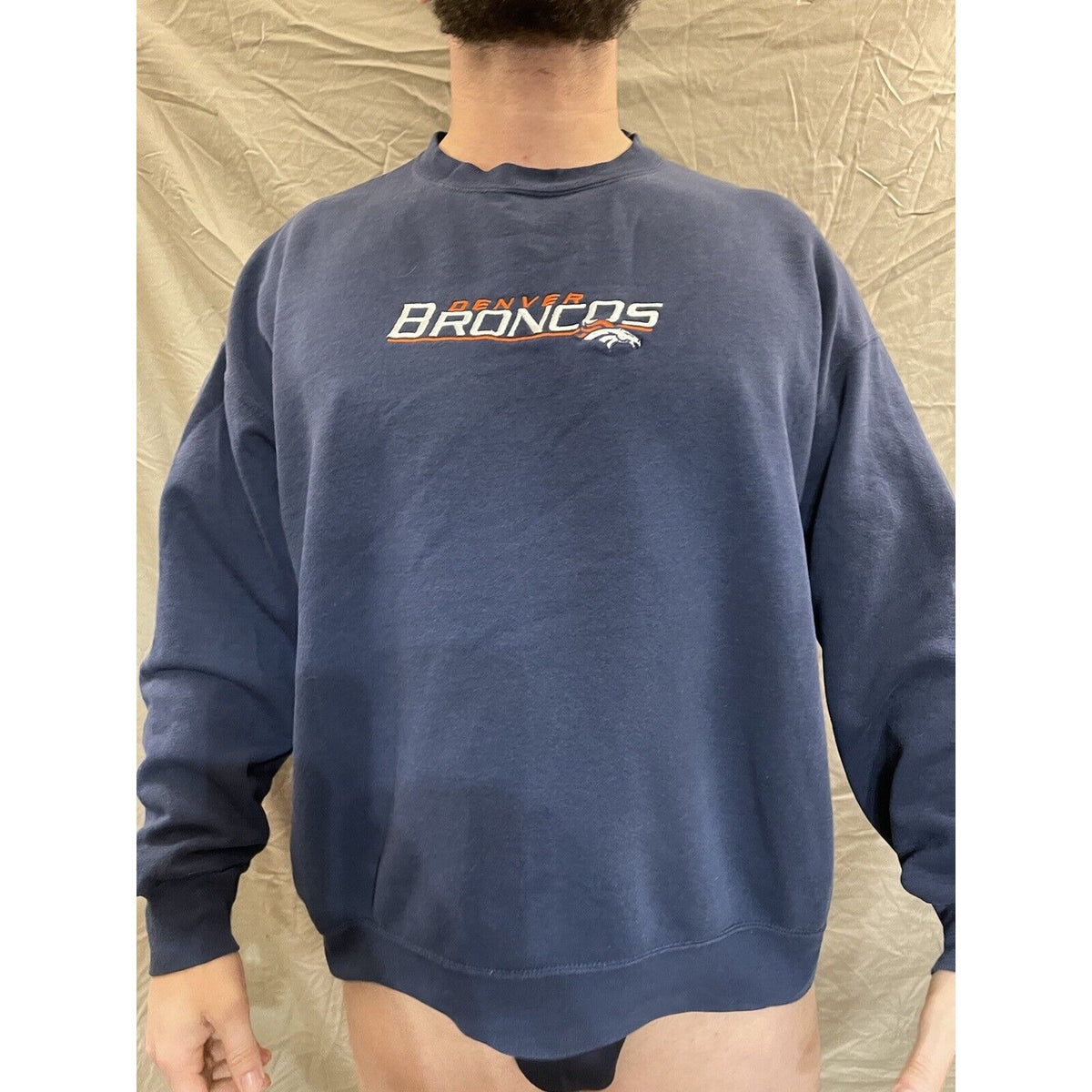 men's navy blue denver broncos pullover sweatshirt fits lke a big large