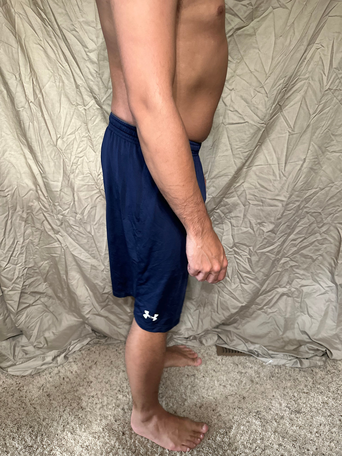 Men’s navy blue under armour heat gear loose shorts athletic no pockets rampart ridge high school track and field