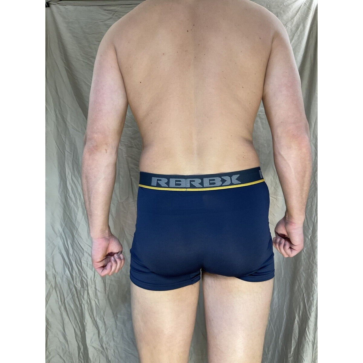 men's blue rbx compression boxer briefs yellow line on band Medium