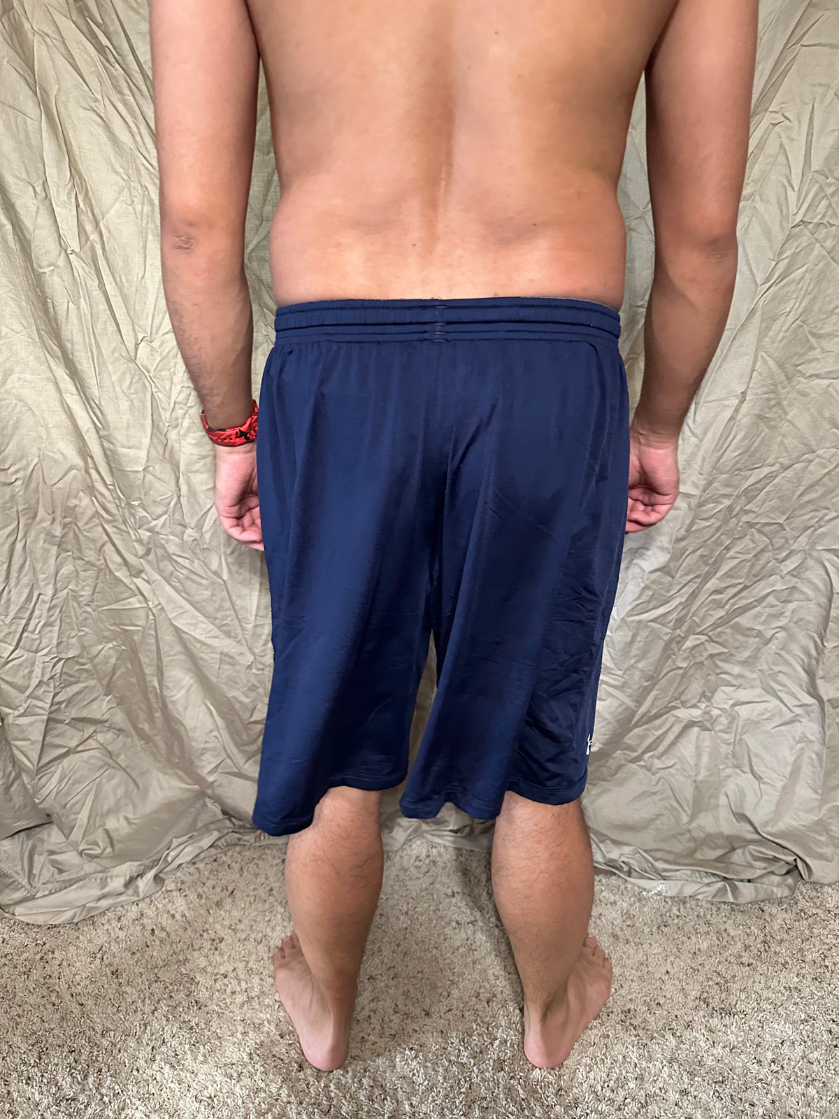 Men’s navy blue under armour heat gear loose shorts athletic no pockets rampart ridge high school track and field
