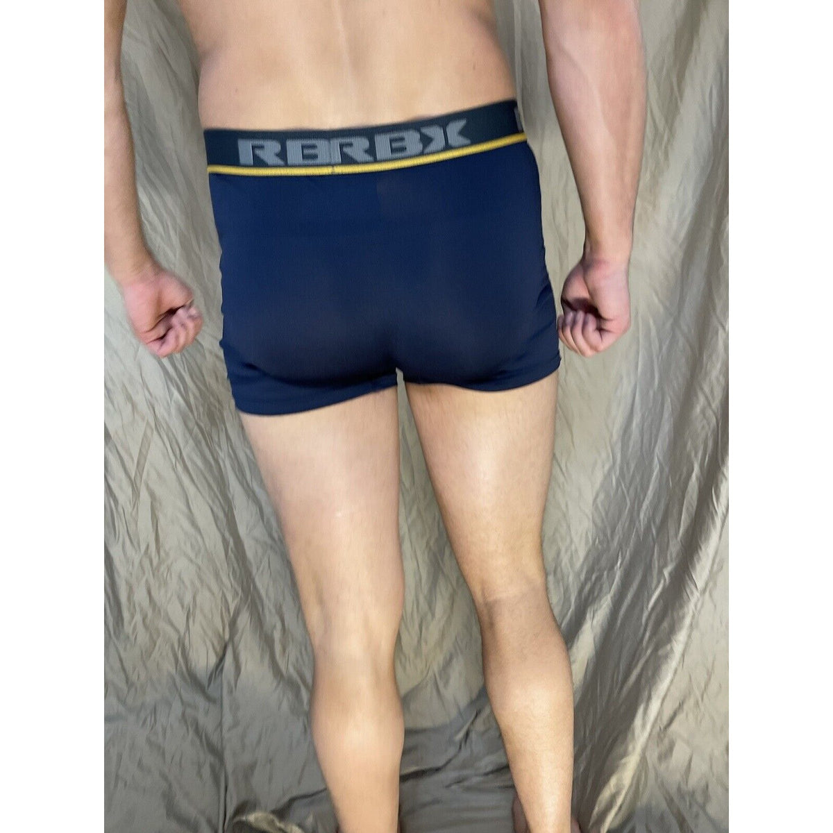 men's blue rbx compression boxer briefs yellow line on band Medium