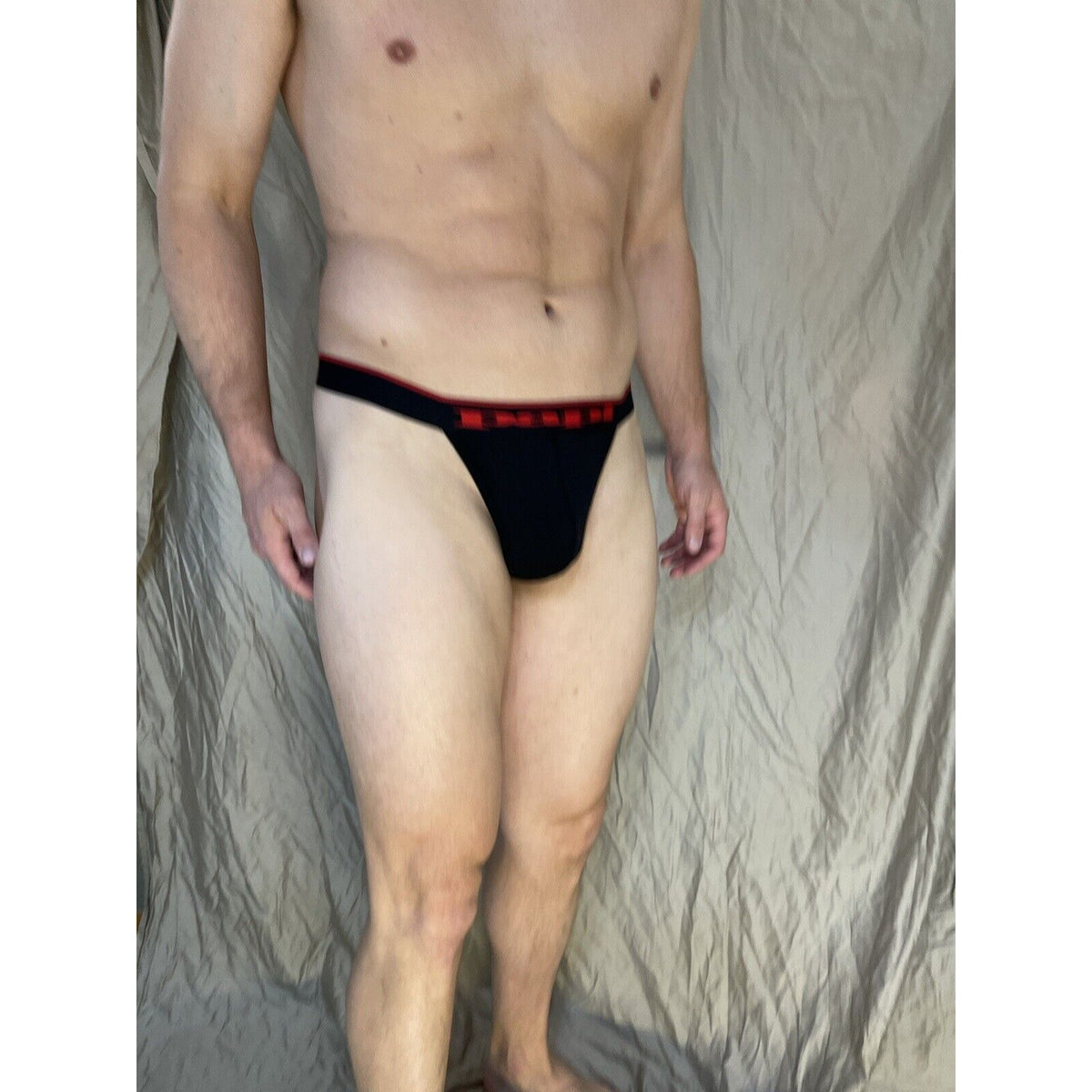 men's Black papi thong Red Lettering On band Small