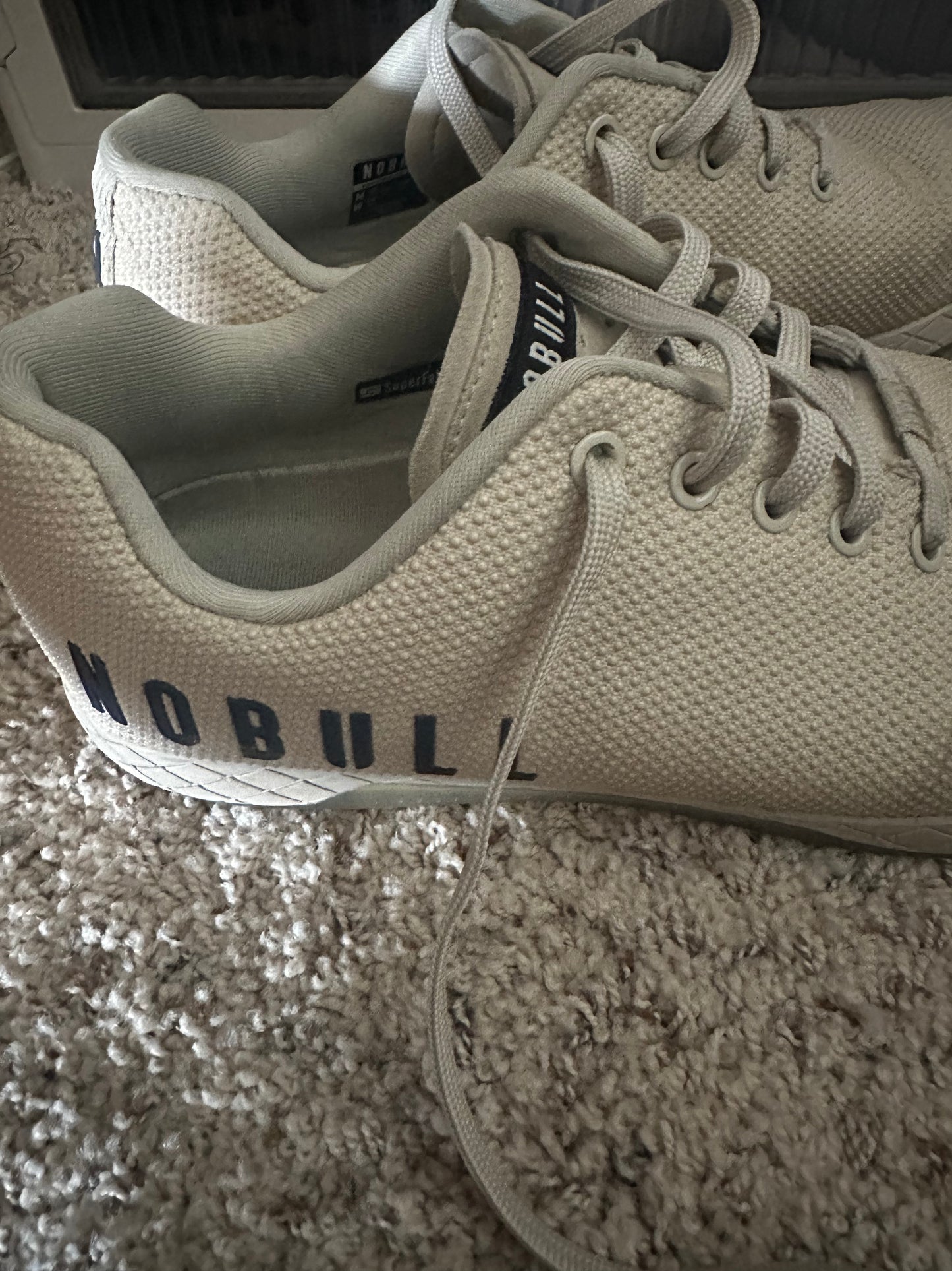 Size 12 military boots and size 12 sneakers