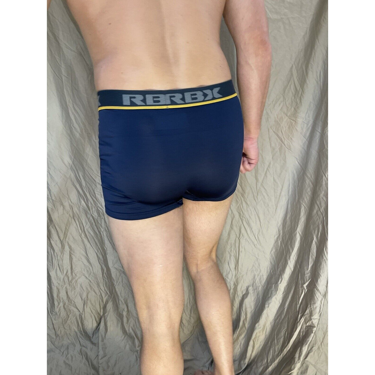 men's blue rbx compression boxer briefs yellow line on band Large