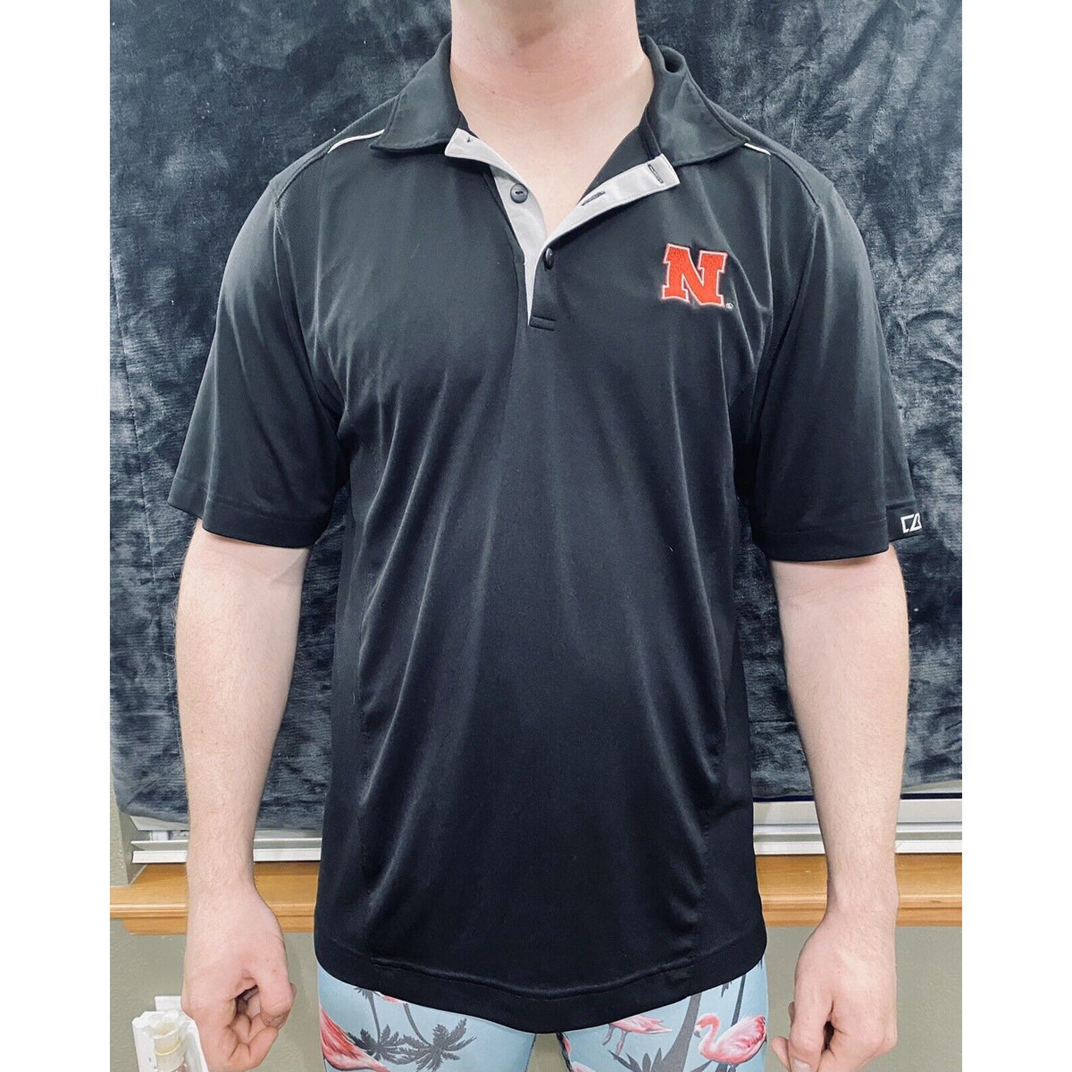 Nebraska Huskers Black Microfiber Cutter & Buck Athletic Polo Shirt
